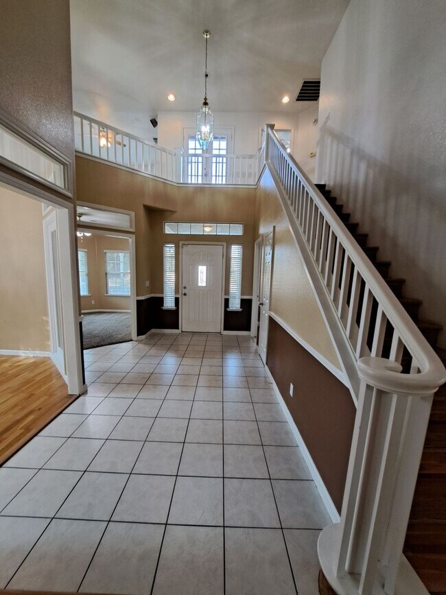 Building Photo - Move in Special: Half OFF your 1st Month's Rent! Elegant 4 Bedroom Home w/ Upstairs Loft Move in ...