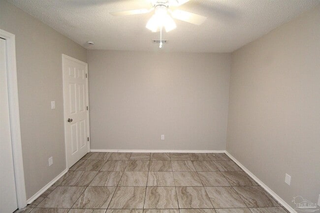 Building Photo - 6810 Tiki Ln
