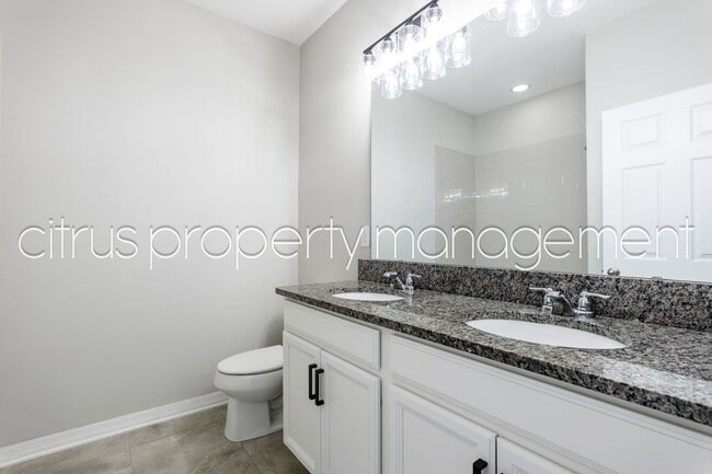 Building Photo - Stunning Double Waterfront 4/3 Home with Dock and Electric Boat Lift