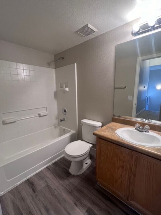 Building Photo - Three bedroom townhouse with 2 car garage