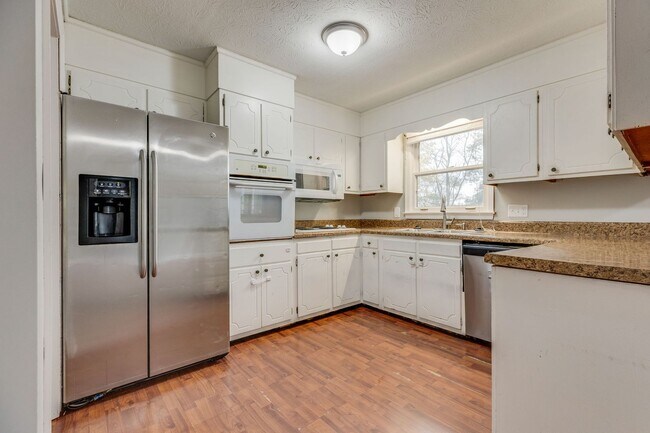 Building Photo - Spacious 3-Bedroom Home with Finished Base...