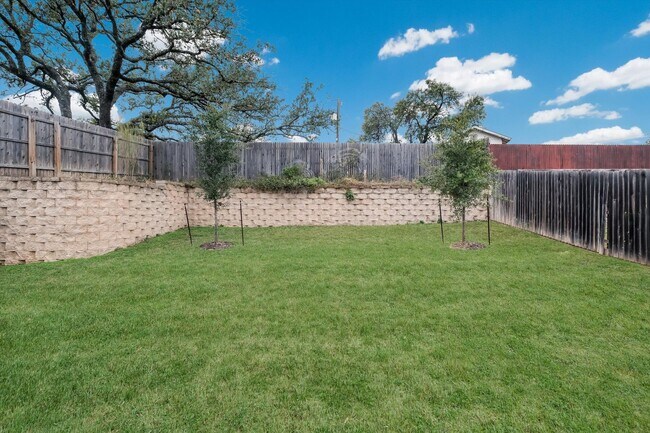 Building Photo - Open-Concept Living with New Flooring