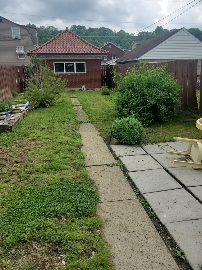 Fenced in backyard with nice 1 car garage - 1312 4th Ave