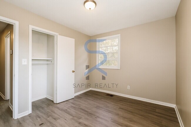 Building Photo - Move in before December 31st and choose your reward: a $250 Amazon Gift Card or a 55" Smart TV!