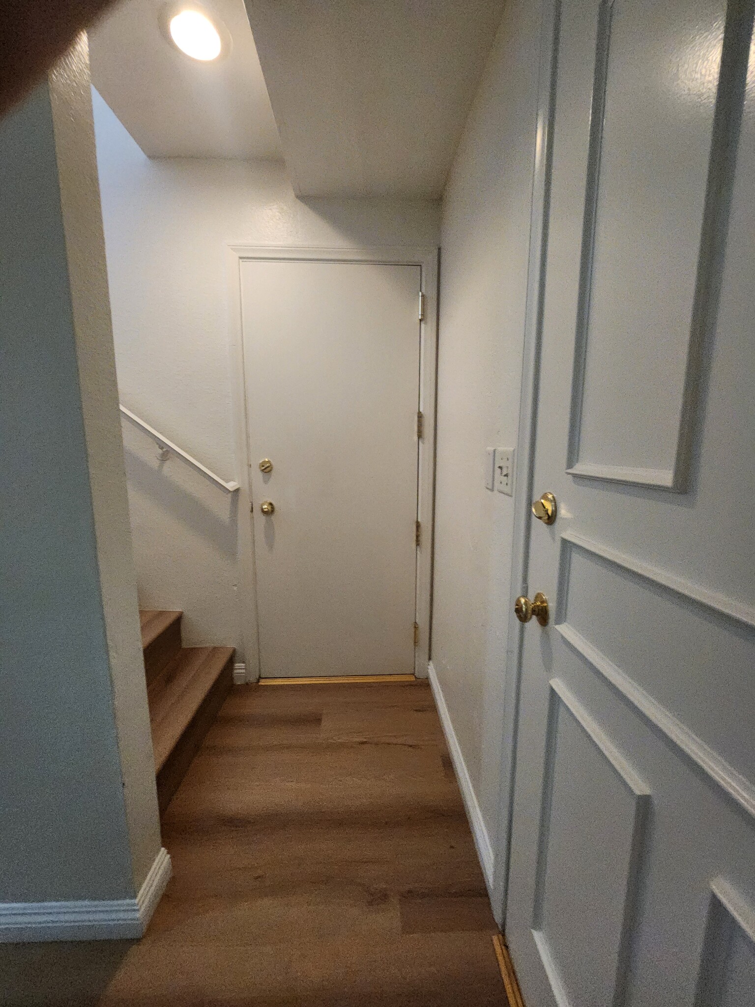 Hallway to front, gar, u/s - 625 S Osage Ave