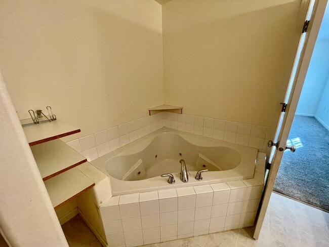 Building Photo - Ranch style 3bedroom/2 bathroom with an Oversized two car garage +giant carport!  Large private l...