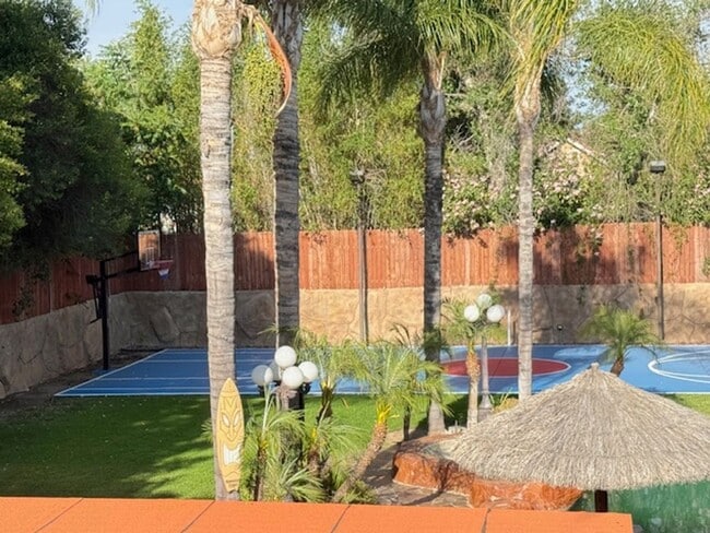 Building Photo - Gated estate with a backyard oasis