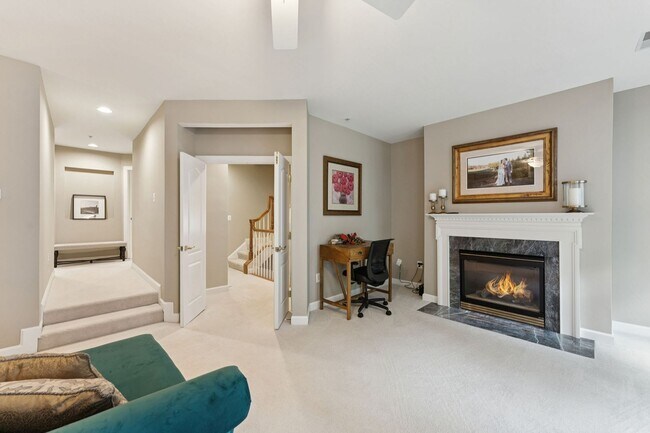 Building Photo - Discover this stunning four-level townhous...