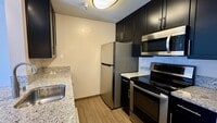 Building Photo - Largest 1-Bedroom Layout with In Unit Laundry
