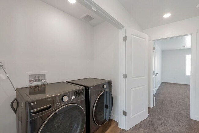 Building Photo - BRAND NEW LUXURY ROW END TOWNHOUSE W 2 CAR GARAGE