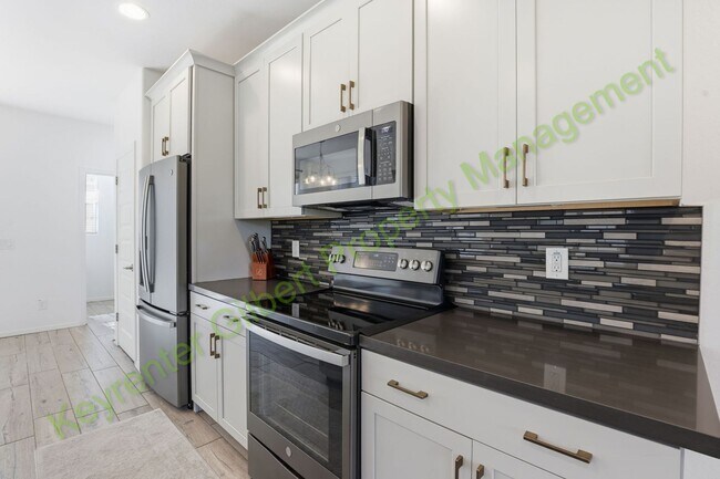 Building Photo - Modern Gilbert Lakeview Townhome in The La...