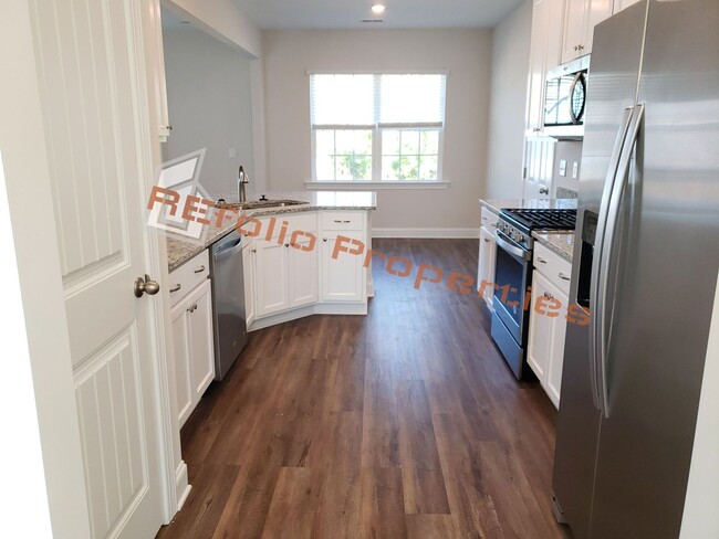 Building Photo - Charming 4 Bedroom, 2.5 Bath, 2-Car Garage...