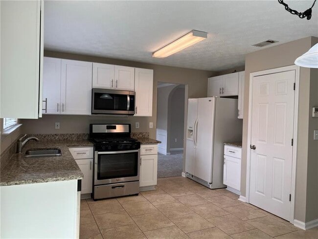 Building Photo - 1348 Woodcutt Pl