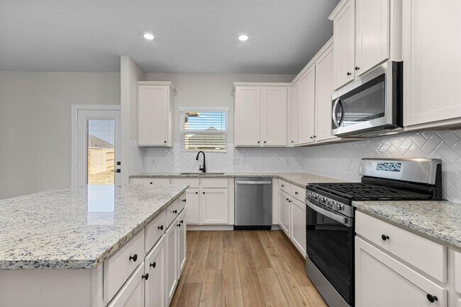 Building Photo - 1006 Whispering Winds Dr