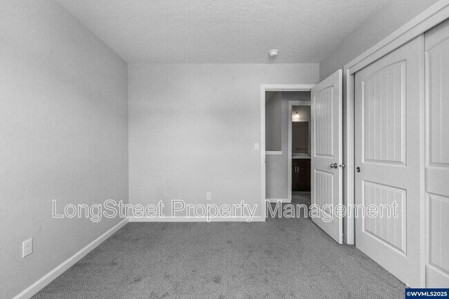 Building Photo - 7177 SE Sarah Dr