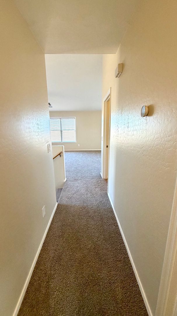 Building Photo - Spacious Surprise home with large backyard