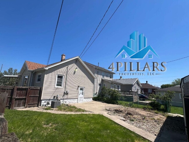Building Photo - "Charming 3-Bed Home with Partially Finished Basement & Gleaming Hardwood Floors in Hammond - 226...