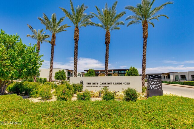 Building Photo - 6587 N Palmeraie Blvd