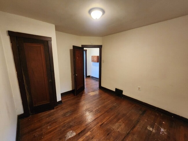 Building Photo - 4 BR home with first-floor living, new roof, and a private-feeling backyard in Lincoln Place