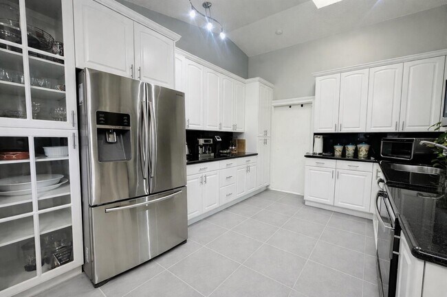 Building Photo - Rustlewood Avenue, Boca Raton, FL 33428 - 4 BR 2 BA single-family home
