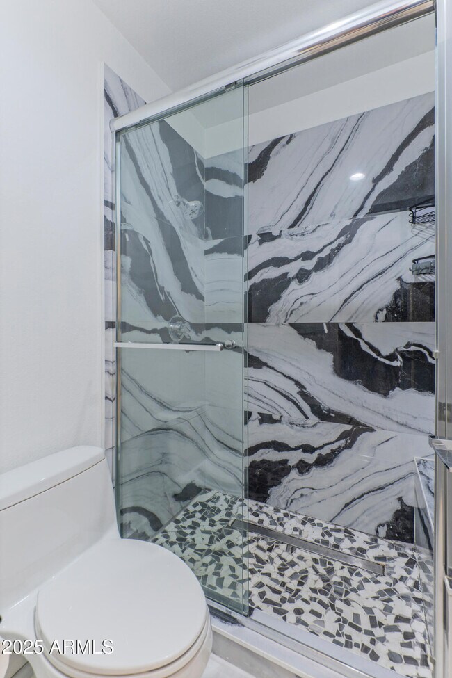 Building Photo - 9450 E Becker Ln