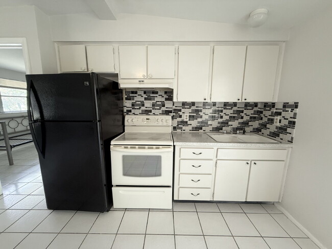 Building Photo - "Charming 1-Bedroom Duplex Retreat on Carn...