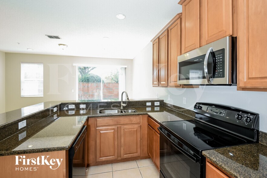 Building Photo - 9576 Silver Buttonwood St