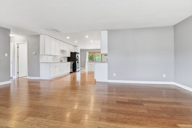 Building Photo - $3,045.95, 3 bed, 2 bath house in Denver with Fenced in Yard and In Unit Laundry!