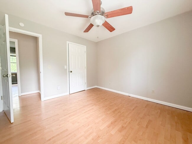 Building Photo - Spacious 3-Bedroom Home with Screened Porch, 2-Car Garage + Workshop