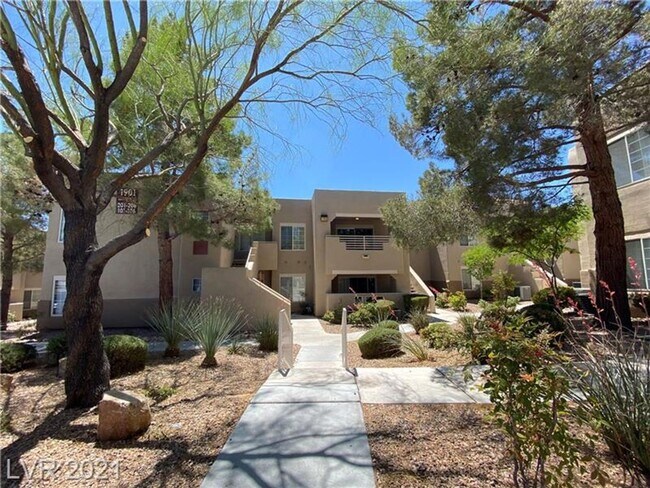 Building Photo - Cozy 1-Bed Condo in Gated 89128 Community ...