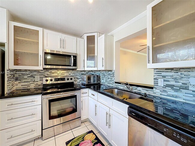 Building Photo - 8740 N Sherman Cir