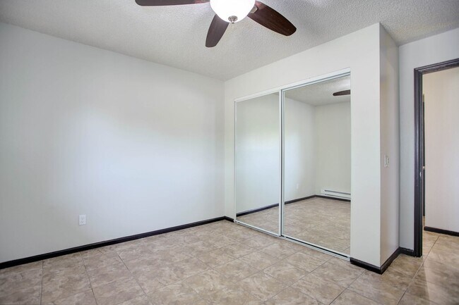 Building Photo - Penthouse level condo with views of canal and trail!