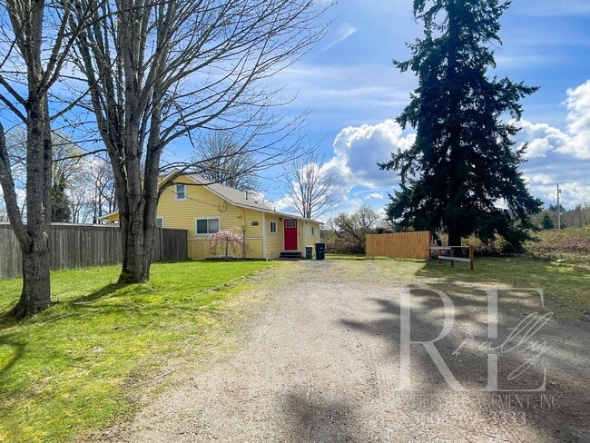 Building Photo - Whimsical Craftsman with Wraparound Porch, Bonus Room & Liberty Bay Peek Views