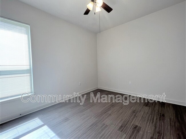 Building Photo - 7677 River Ridge Dr