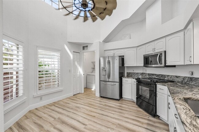 Building Photo - Stunning Custom Rental in Gated 55+ Royal ...
