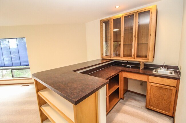 Building Photo - Spacious 4-Bedroom Home with Stunning Lake...