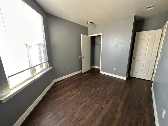 Experience the comfort of this charming bedroom retreat, complete with ample natural light. - Williams Street