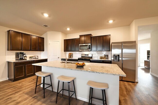 Building Photo - 4 BEDROOMS  |  2 BATHS  |  2 CAR GARAGE  |  BUILT 2023  |  RESORT STYLE COMMUNITY CENTER