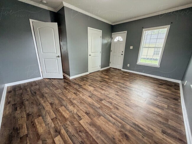 Building Photo - Move-In Ready in Sulphur | Updated 2BR Home w/ Covered Front Porch + Granite Countertops