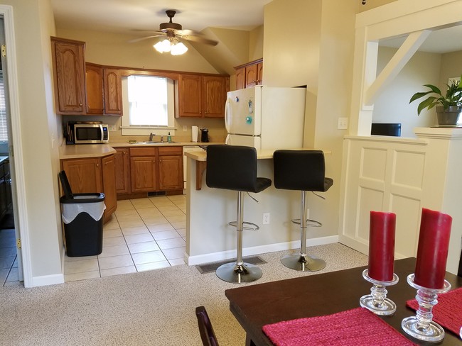 Dining Area flows into Kitchen - 103 W 12th St