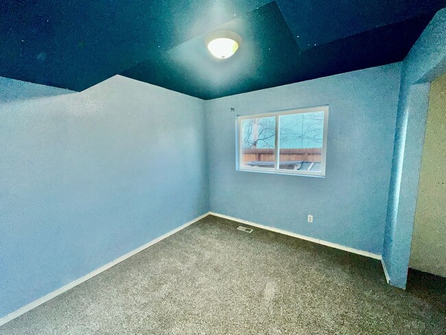 Building Photo - Check out the private fenced backyard!