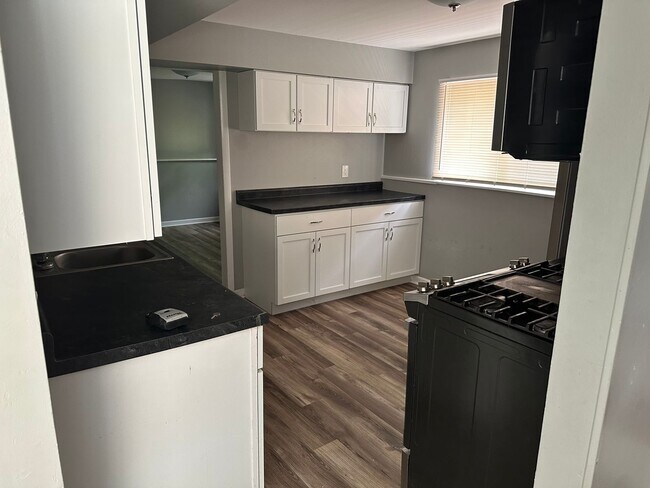 Building Photo - Welcome to our charming home for Rent