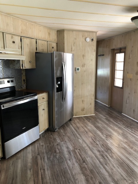 Kitchen with Stainless Steel Appliances - Engineered hardwood throughout the home - 2924 Tindel Camp Rd