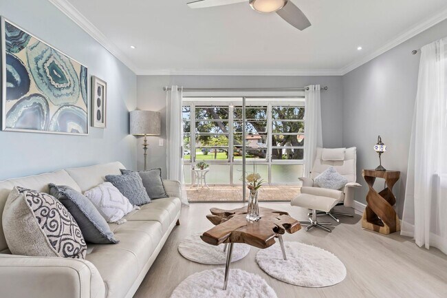 Building Photo - (55+) 2/2 Fully Renovated Furnished Condo ...