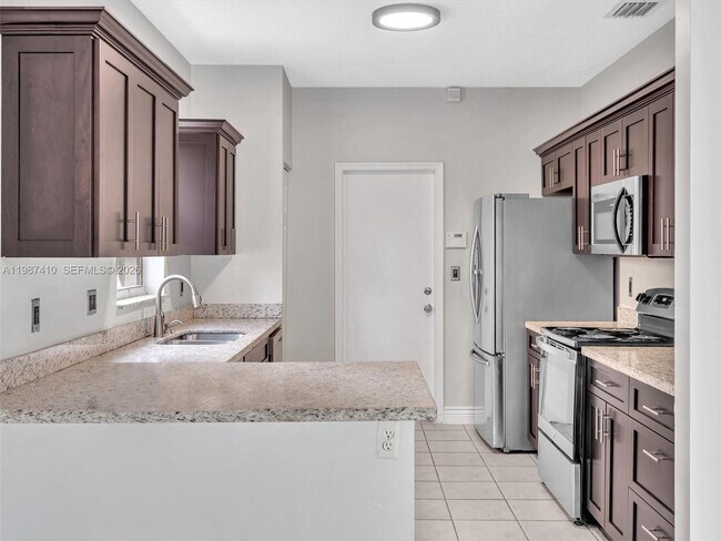 Building Photo - 1498 SW 106th Ave