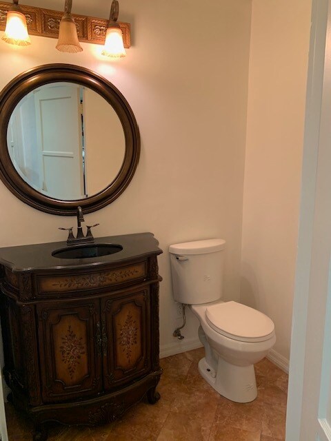 Powder room - 251 N Almont Dr