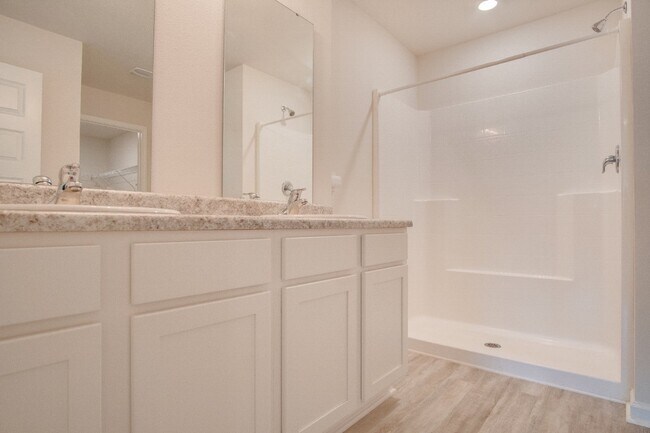 Building Photo - 4-Bed, 2-Bath Home in Woodlands Subdivision with Solar, Open-Concept Living, Modern Kitchen, Fenc...