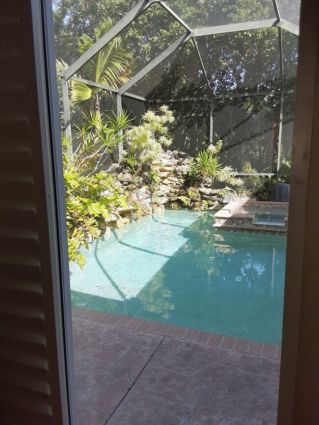 Building Photo - Annual unfurnished 3/2 SFH with pool in The Oaks!