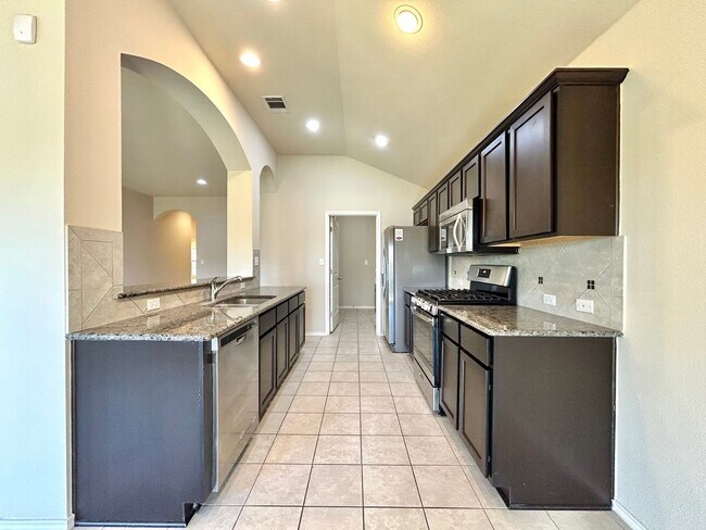Building Photo - Charming 3-Bedroom Home with Open Layout & Covered Patio!