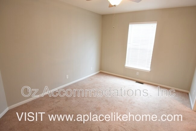Building Photo - 1151 N Mart-way Dr